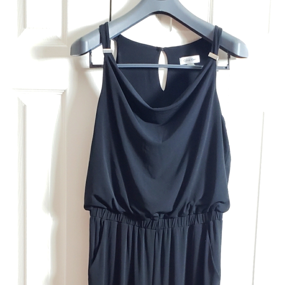 Calvin Klein jumpsuit. Silver accents. Size 8.